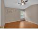 Bedroom featuring a ceiling fan and natural light from the window enhances the welcoming atmosphere at 207 Diamond Valley Pass, Canton, GA 30114