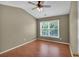 Bedroom featuring a ceiling fan and natural light from the window enhances the welcoming atmosphere at 207 Diamond Valley Pass, Canton, GA 30114