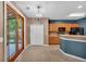 Bright dining area with access to the back yard, adjacent to the kitchen with a breakfast bar at 207 Diamond Valley Pass, Canton, GA 30114