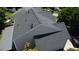 Aerial view of a roof with dark shingles and visible vents at 207 Diamond Valley Pass, Canton, GA 30114