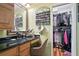 This bathroom has black granite counter top, light yellow walls and a mirror at 3025 Mountain Creek Ne Ct, Roswell, GA 30075
