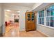 Cozy breakfast nook adjacent to kitchen features a large window and vintage display cabinet at 3025 Mountain Creek Ne Ct, Roswell, GA 30075