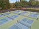 Overhead view of new community pickleball courts with nets and green and blue playing surfaces at 303 Ridgewood Trl, Canton, GA 30115