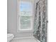 Upstairs bathroom with new vinyl floors, shower and tub combo at 3990 Madison Main Nw, Kennesaw, GA 30144