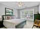 Bedroom featuring neutral gray walls, queen bed, and large window at 3990 Madison Main Nw, Kennesaw, GA 30144