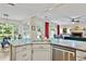Gourmet kitchen with breakfast bar overlooking breakfast area and main living area at 3990 Madison Main Nw, Kennesaw, GA 30144