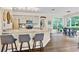 Modern kitchen features granite countertops, stainless steel appliances, and breakfast area at 3990 Madison Main Nw, Kennesaw, GA 30144