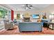 Comfortable living room features a fireplace, ample seating, and natural light from large windows at 3990 Madison Main Nw, Kennesaw, GA 30144