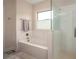 Modern bathroom showcasing a soaking tub, separate shower, and stylish fixtures at 7345 Vale Ct, Cumming, GA 30028