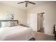 Bright and airy bedroom with a ceiling fan and natural light at 7345 Vale Ct, Cumming, GA 30028