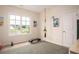 Bright room with exercise equipment and a large window offering neighborhood views at 7345 Vale Ct, Cumming, GA 30028