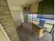 Screened in porch featuring a lone chair at 1785 S Olympian Sw Way, Atlanta, GA 30310