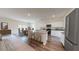 Spacious open-concept kitchen and dining area with an island, stainless appliances, and ample cabinet space at 333 Torcello Blvd, Mcdonough, GA 30253