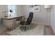 Bright office space with modern desk, comfortable chair, and ample natural light for a productive workspace at 412 Corricella Ct, Mcdonough, GA 30253