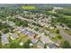 Overhead shot that shows the house's location near a park, neighborhood, and pond at 648 York View Dr, Auburn, GA 30011