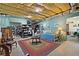 Finished basement featuring carpet, daybed, seating, and storage and plenty of room at 648 York View Dr, Auburn, GA 30011