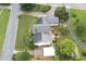 Birds-eye view of property, displaying roof, mature trees, and neighboring houses in a quiet location at 2692 Wellington Dr, Marietta, GA 30062