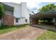 A spacious carport area attached to a house with additional greenery around it at 2692 Wellington Dr, Marietta, GA 30062