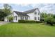 Beautiful two-story home with lush green lawn and well-maintained landscaping at 2692 Wellington Dr, Marietta, GA 30062