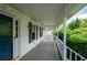 A wide, covered front porch offers a relaxing outdoor space at 2692 Wellington Dr, Marietta, GA 30062