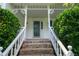 A welcoming front porch enhances the curb appeal of this charming home at 2692 Wellington Dr, Marietta, GA 30062