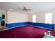 A cozy living space features a classic two-tone wall design and carpet at 2692 Wellington Dr, Marietta, GA 30062
