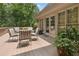 Outdoor deck with comfortable seating for six, perfect for dining al fresco, with mature trees at 3616 Blakeford Ct, Marietta, GA 30062