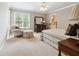 Bedroom with a sitting area, decorative chair, plush carpets and natural light at 3616 Blakeford Ct, Marietta, GA 30062