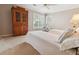 Comfortable bedroom featuring twin beds, window views, and built-in storage at 3616 Blakeford Ct, Marietta, GA 30062