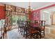 Formal dining room with elegant furnishings, a large window, and decorative wall art at 3616 Blakeford Ct, Marietta, GA 30062