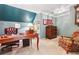 Traditional office with a wooden desk, leather chair, colorful area rug, and built-in cabinet at 3616 Blakeford Ct, Marietta, GA 30062