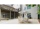 Backyard patio seating area with an umbrella and outdoor dining furniture at 3616 Blakeford Ct, Marietta, GA 30062