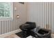 Stylish powder room with a sleek, modern black toilet and sink at 3616 Blakeford Ct, Marietta, GA 30062