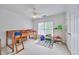 Bright, colorful bedroom features a bunk bed with soft carpet and natural light at 370 Beracah Sw Trl, Atlanta, GA 30331