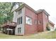Exterior of a two-story brick home with deck and plenty of windows at 370 Beracah Sw Trl, Atlanta, GA 30331