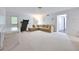 Spacious living room with a neutral color scheme, plush carpet and a comfortable sectional sofa at 370 Beracah Sw Trl, Atlanta, GA 30331