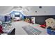 Fun-filled playroom complete with toys, slide, and hopscotch rug at 370 Beracah Sw Trl, Atlanta, GA 30331