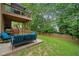 Relaxing backyard with a patio, a deck, a garden, and a privacy fence at 404 Pine Grove Way, Woodstock, GA 30189