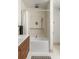 Modern bathroom featuring a sleek vanity, soaking tub, and stylish fixtures at 124 Richmond Se St, Atlanta, GA 30312