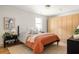 Serene bedroom featuring neutral tones, a comfortable bed, and ample closet space at 124 Richmond Se St, Atlanta, GA 30312
