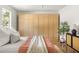 Relaxing bedroom featuring neutral tones, a comfortable bed, and ample closet space at 124 Richmond Se St, Atlanta, GA 30312