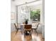 Bright dining room with a stylish table and chairs, complemented by natural light at 124 Richmond Se St, Atlanta, GA 30312