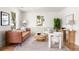 Cozy living room featuring stylish seating, a decorative rug, and a sunlit window at 124 Richmond Se St, Atlanta, GA 30312