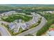 Aerial view of a residential neighborhood surrounded by lush greenery and tree-lined streets at 2075 Parkhaven Ct, Roswell, GA 30076