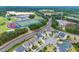 Aerial view of a residential neighborhood near a school, showcasing the community's convenient location at 2075 Parkhaven Ct, Roswell, GA 30076