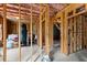 Unfinished basement featuring wooden framing and a concrete floor, ready for customization and personalization at 2075 Parkhaven Ct, Roswell, GA 30076