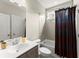 Bathroom featuring a modern vanity, bathtub-shower combo, and custom curtain at 2075 Parkhaven Ct, Roswell, GA 30076