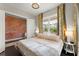 Comfortable bedroom with natural light and calming interior design at 2075 Parkhaven Ct, Roswell, GA 30076
