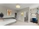 Comfortable bedroom featuring a daybed, ensuite bath, and dedicated study space at 2075 Parkhaven Ct, Roswell, GA 30076