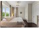 Serene bedroom with large windows and neutral decor at 2075 Parkhaven Ct, Roswell, GA 30076